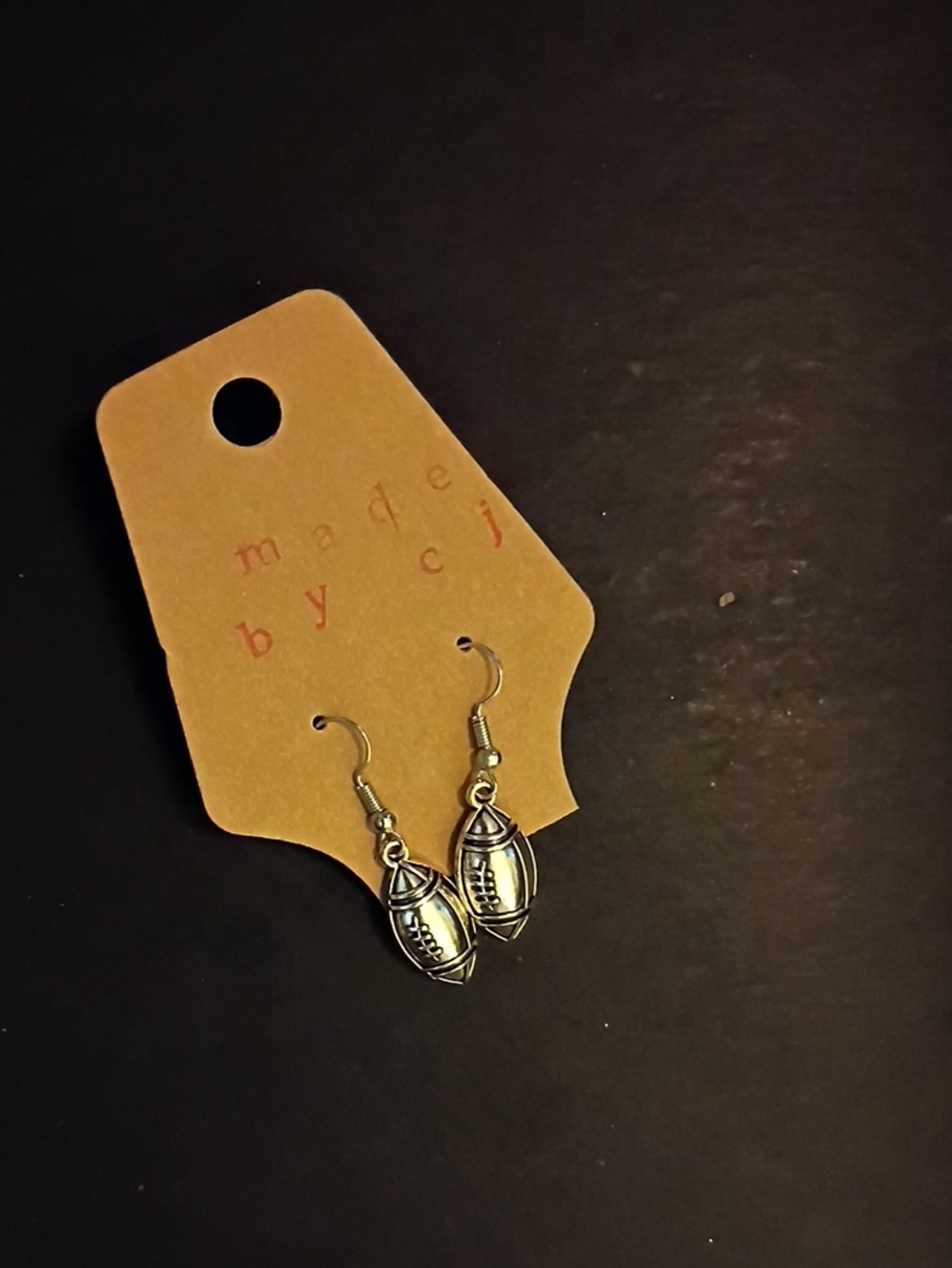 Hand Crafted silver-tone football charm earrings